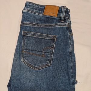 American Eagle High Waisted Distressed Knee and Ankle Loose Fit Jeans